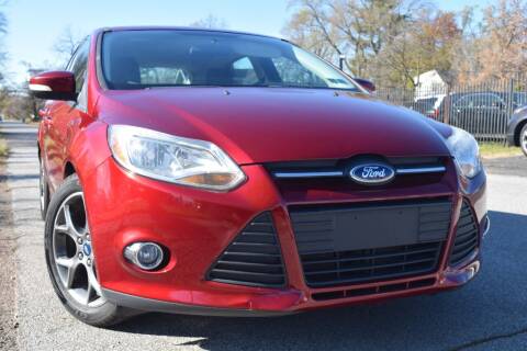 2014 Ford Focus for sale at QUEST AUTO GROUP LLC in Redford MI