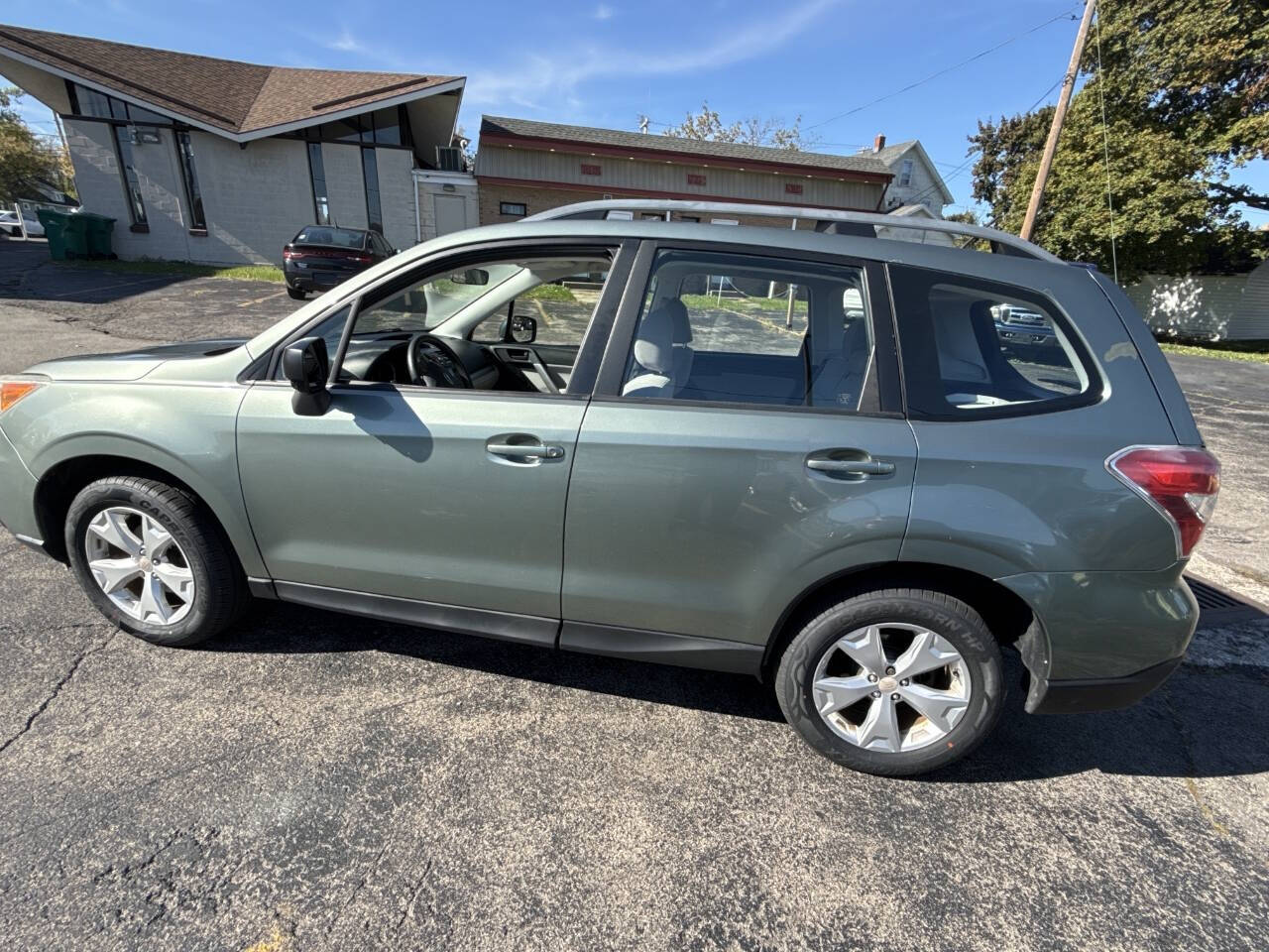 2015 Subaru Forester for sale at Rochester Imports LLC in Webster, NY