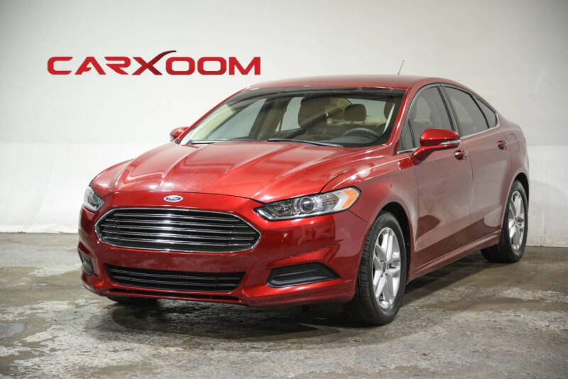 2014 Ford Fusion for sale at CARXOOM in Marietta GA