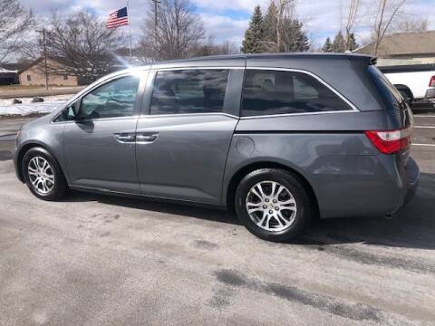 2012 Honda Odyssey for sale at AM Auto Sales in Vadnais Heights MN