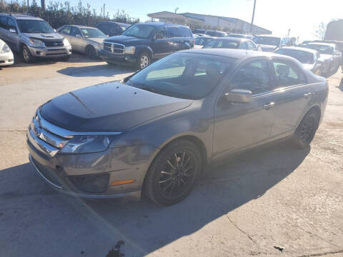 2012 Ford Fusion for sale at Palmer Automobile Sales in Decatur GA