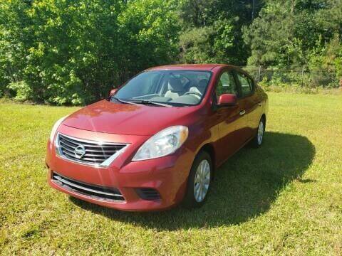 2013 Nissan Versa for sale at Poole Automotive in Laurinburg NC