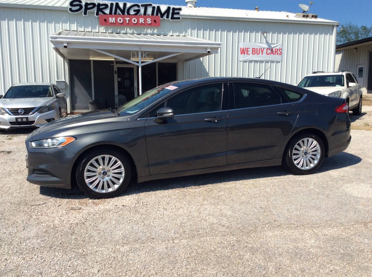 2016 Ford Fusion Hybrid for sale at SPRINGTIME MOTORS in Huntsville, TX