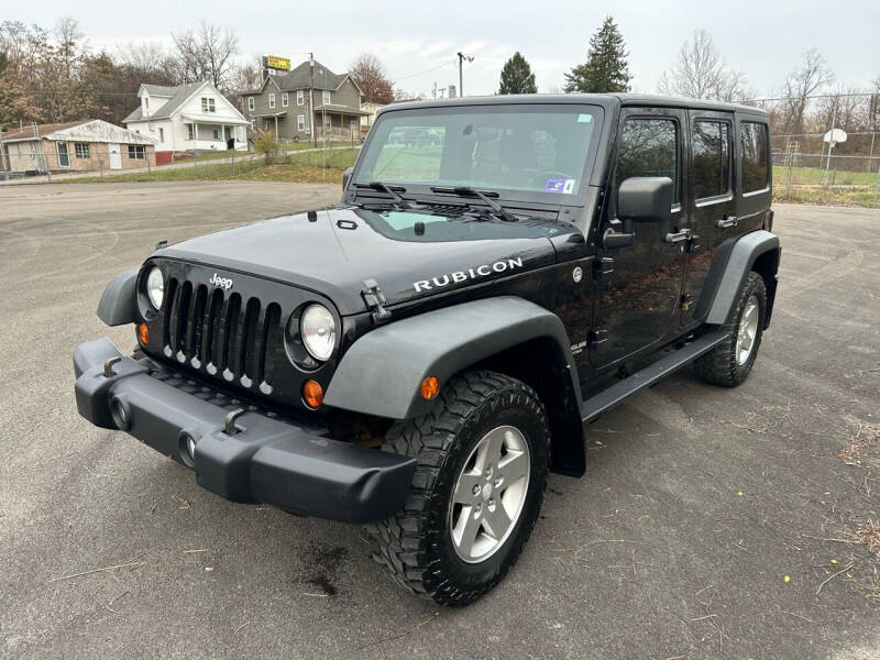 2011 Jeep Wrangler Unlimited for sale at Bailey's Pre-Owned Autos in Anmoore WV