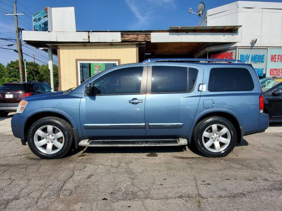 2010 Nissan Armada for sale at DAGO'S AUTO SALES LLC in Dalton, GA