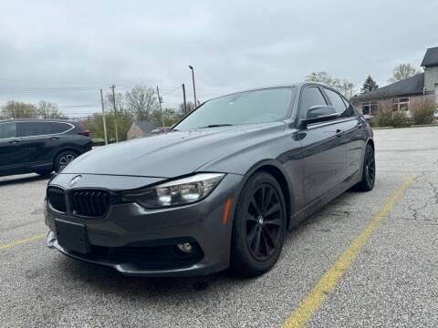 2016 BMW 3 Series for sale at Minnix Auto Sales LLC in Cuyahoga Falls OH