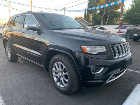 2014 Jeep Grand Cherokee for sale at ROMO'S AUTO SALES in Los Angeles CA