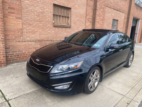 2013 Kia Optima for sale at Domestic Travels Auto Sales in Cleveland OH