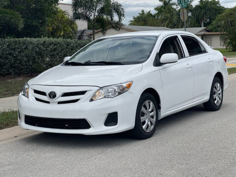 2013 Toyota Corolla for sale at L G AUTO SALES in Boynton Beach FL