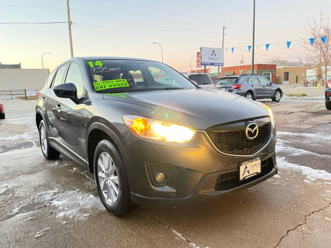 2014 Mazda CX-5 for sale at Apollo Auto Sales LLC in Sioux City IA