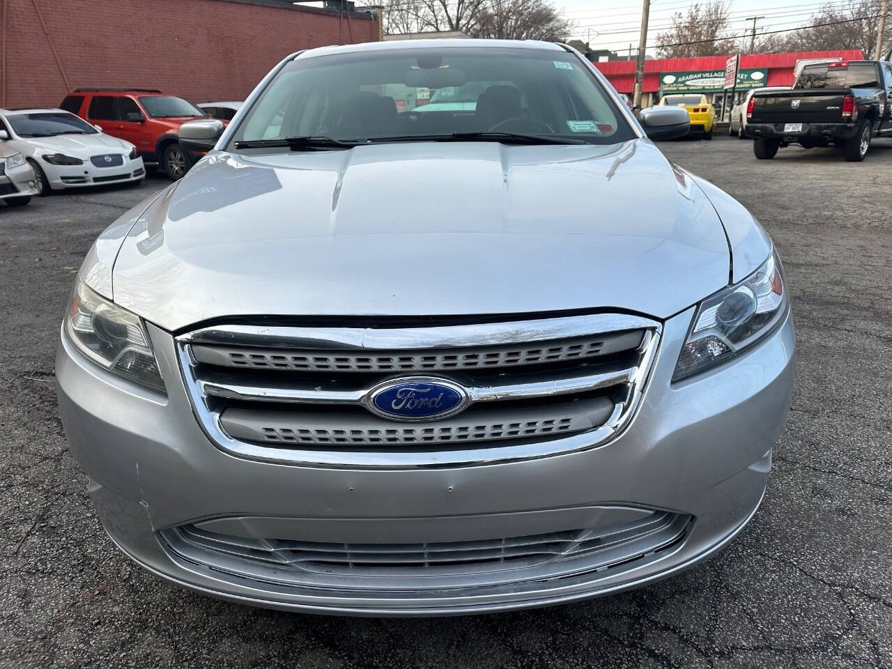 2011 Ford Taurus for sale at Kelly Auto Group in Cleveland, OH