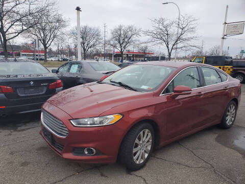 2014 Ford Fusion for sale at J & J Used Cars inc in Wayne MI