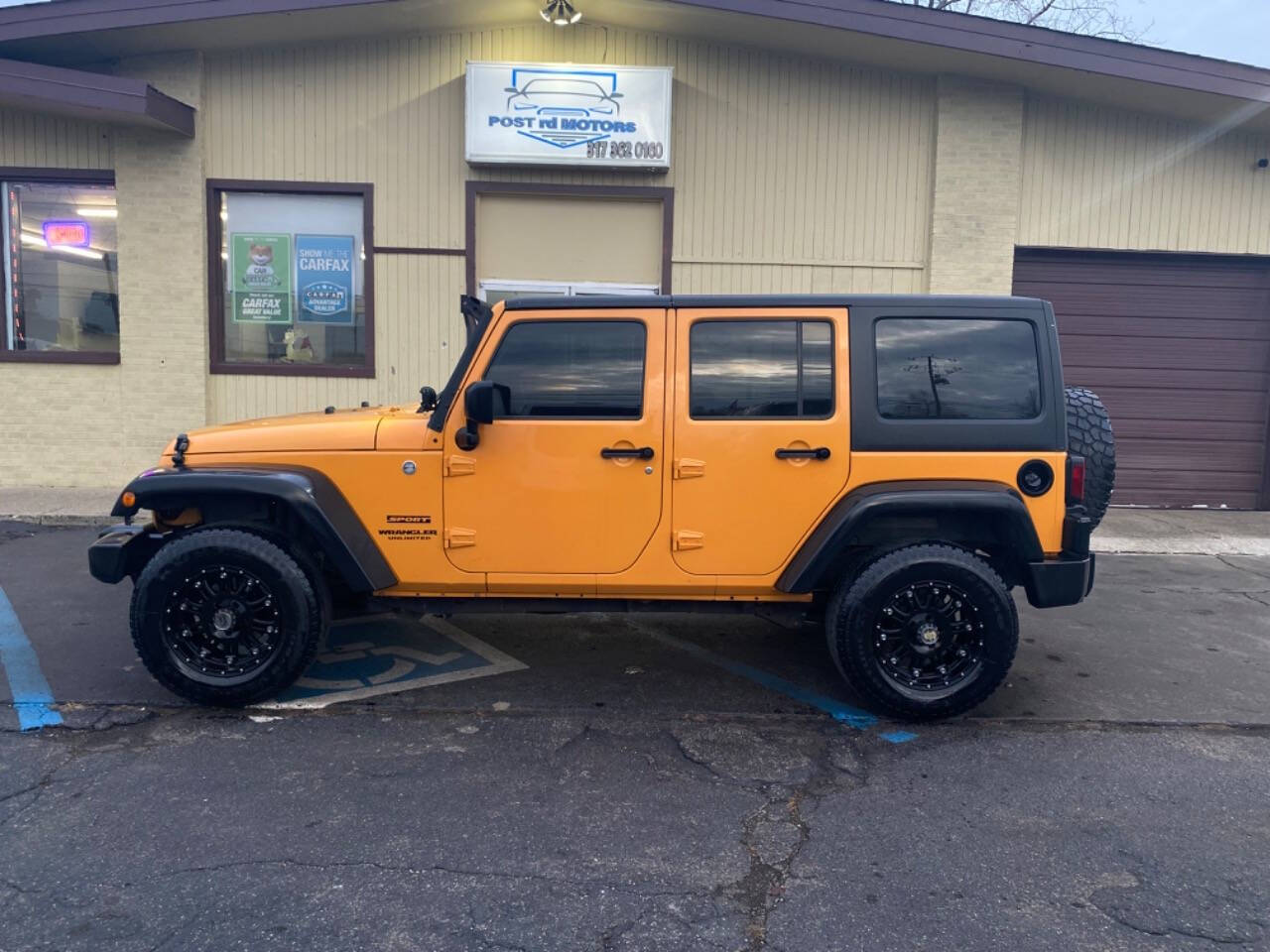 2012 Jeep Wrangler Unlimited for sale at Post Rd Motors in Indianapolis, IN