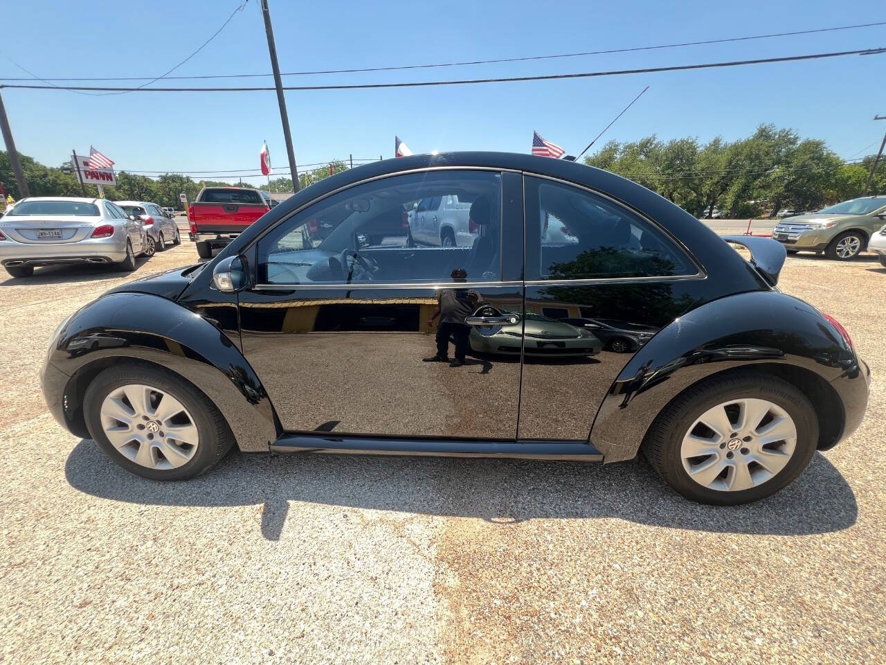 Black 2009 Volkswagen New Beetle Base 2dr Coupe 5M 2