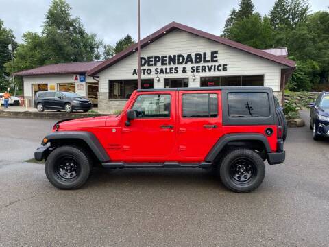 2015 Jeep Wrangler Unlimited for sale at Dependable Auto Sales and Service in Binghamton NY