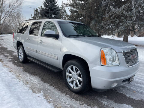 2013 GMC Yukon XL for sale at BELOW BOOK AUTO SALES in Idaho Falls ID