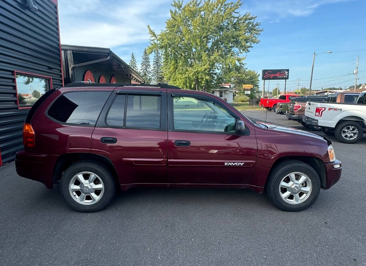 2005 GMC Envoy for sale at SIGNATURE AUTOS LLC in Weston, WI