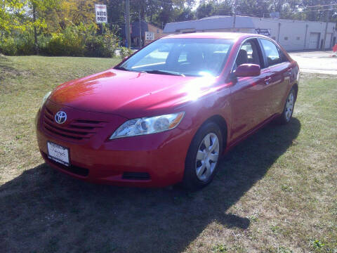 2009 Toyota Camry for sale at Triangle Auto Sales in Elgin IL