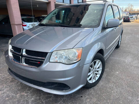 2014 Dodge Grand Caravan for sale at AROUND THE WORLD AUTO SALES in Denver CO