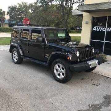 2014 Jeep Wrangler Unlimited for sale at AUTOSPORT in Wellington FL