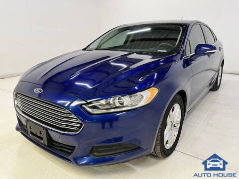 2016 Ford Fusion for sale at Auto Deals by Dan Powered by AutoHouse Phoenix in Peoria AZ