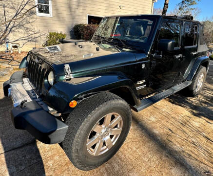 2012 Jeep Wrangler Unlimited for sale at Muscle Car Jr. in Cumming GA