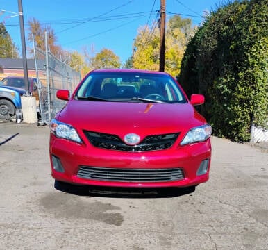 2013 Toyota Corolla for sale at Queen Auto Sales in Denver CO