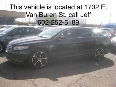 2014 Ford Taurus for sale at Town and Country Motors - 1702 East Van Buren Street in Phoenix AZ