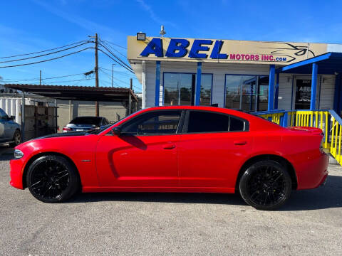 2015 Dodge Charger for sale at Abel Motors, Inc. in Conroe TX