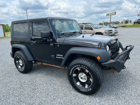 2011 Jeep Wrangler for sale at RAYMOND TAYLOR AUTO SALES in Fort Gibson OK