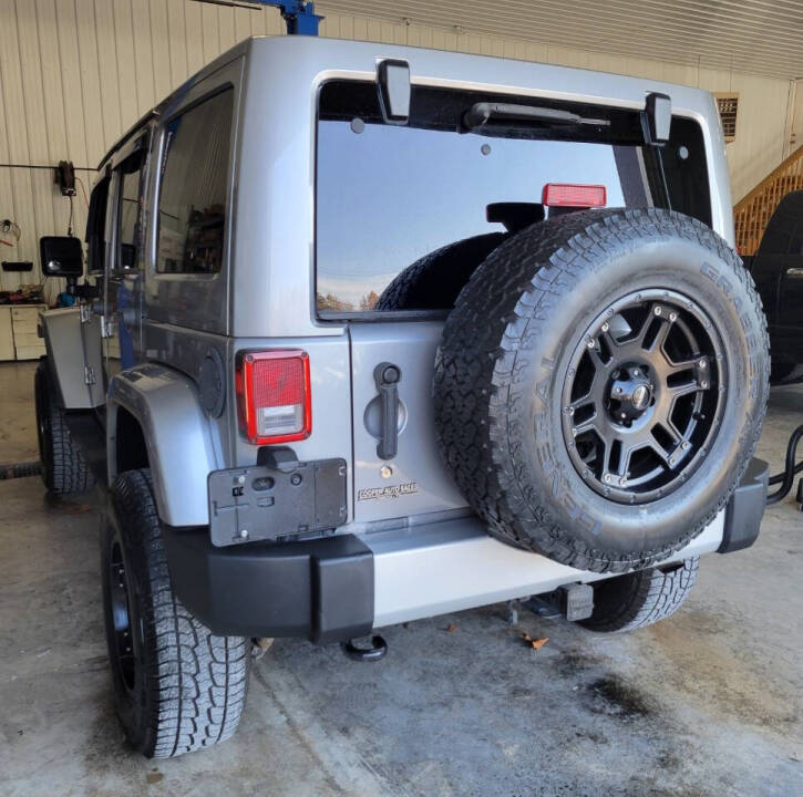 2013 Jeep Wrangler Unlimited for sale at COOPER AUTO SALES in ONEIDA, TN