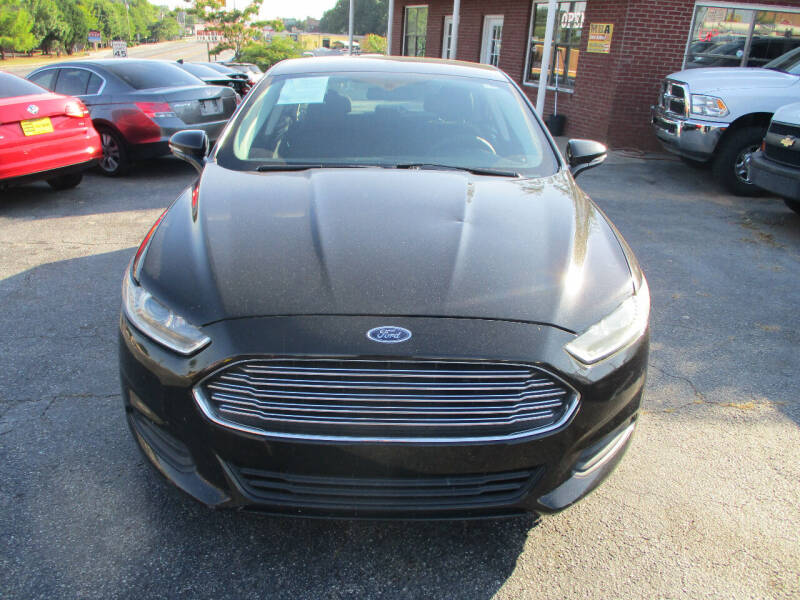 2013 Ford Fusion for sale at LOS PAISANOS AUTO & TRUCK SALES LLC in Doraville GA