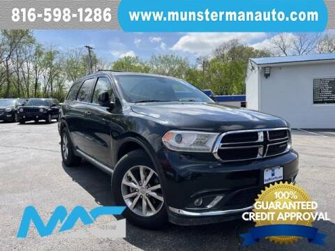 2014 Dodge Durango for sale at Munsterman Automotive Group in Blue Springs MO