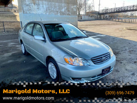 2003 Toyota Corolla for sale at Marigold Motors, LLC in Pekin IL