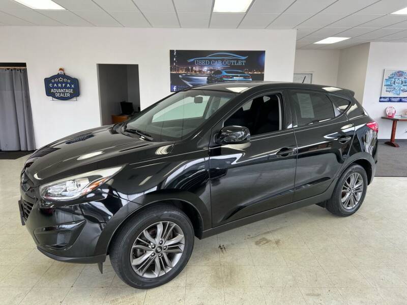 2014 Hyundai Tucson for sale at Used Car Outlet in Bloomington IL