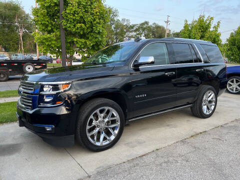 2017 Chevrolet Tahoe for sale at Azteca Auto Sales LLC in Des Moines IA