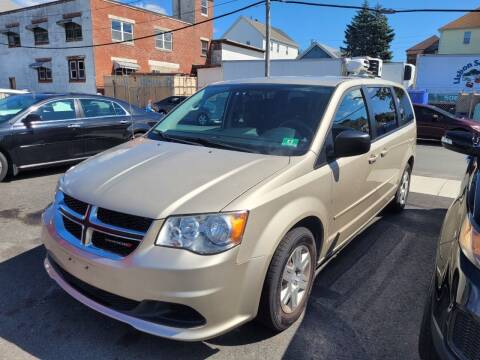 2013 Dodge Grand Caravan for sale at A J Auto Sales in Fall River MA