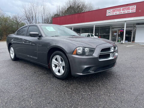 2014 Dodge Charger for sale at Certified Motors LLC in Mableton GA