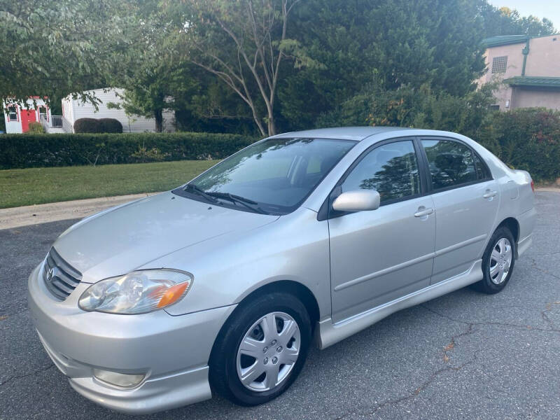 2003 Toyota Corolla for sale at Triangle Motors Inc in Raleigh NC