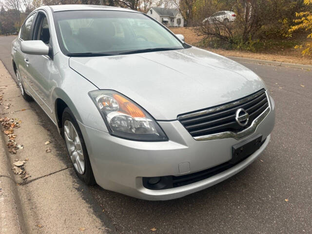 2009 Nissan Altima for sale at JUST AUTOS in MINNEAPOLIS, MN