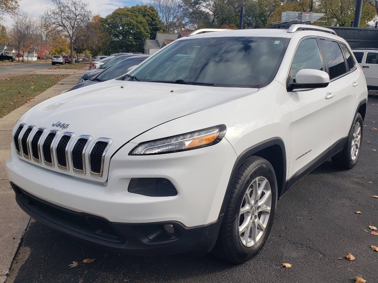 2015 Jeep Cherokee for sale at Auto Shop in Wyoming, MI