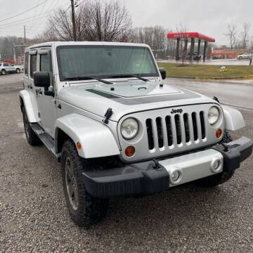 2012 Jeep Wrangler Unlimited for sale at BUCKEYE DAILY DEALS in Lancaster OH