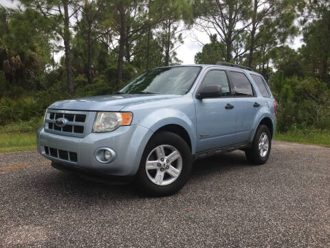 2009 Ford Escape Hybrid for sale at VICTORY LANE AUTO SALES in Port Richey FL