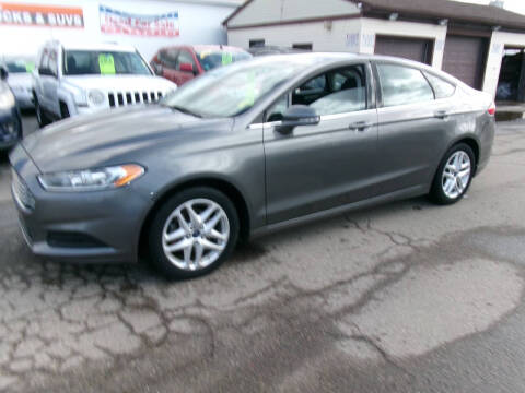 2014 Ford Fusion for sale at Aspen Auto Sales in Wayne MI