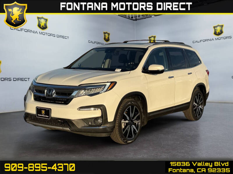 2022 Honda Pilot Touring w/Rear Captain's Chairs