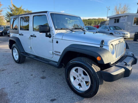 2011 Jeep Wrangler Unlimited for sale at Atlantic Auto Sales in Garner NC