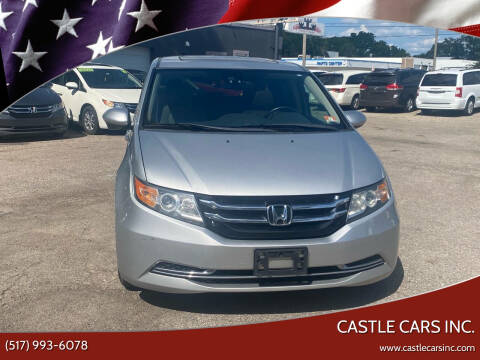 2015 Honda Odyssey for sale at Castle Cars Inc. in Lansing MI