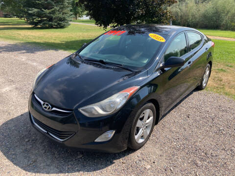2013 Hyundai Elantra for sale at BELOW BOOK AUTO SALES in Idaho Falls ID