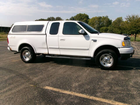 1999 Ford F-150 for sale at Crossroads Used Cars Inc. in Tremont IL