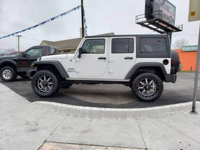 2014 Jeep Wrangler Unlimited for sale at Messick's Auto Sales in Salisbury MD